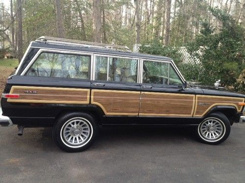 1991 jeep grand wagoneer woody/  115k/ southern truck/ black with tan interior