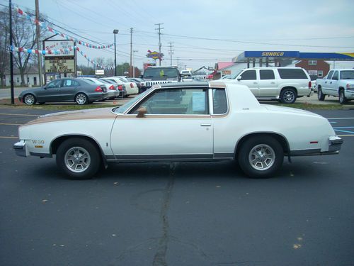 1980 oldmobile cutlass 442 with t-tops white and gold