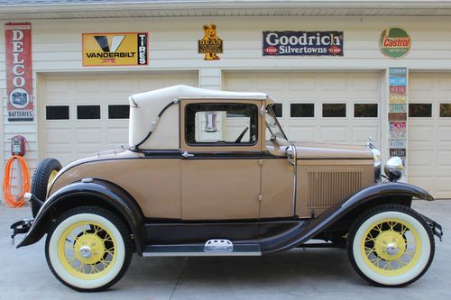 1930 model a sport coupe....rumble seat.... 5 good wide white-wall tires