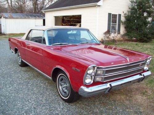 1966 7-litre galaxie. red exterior convertible top runs and drives great.