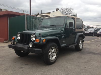 Sport edition factory soft top/hard top auto 4x4 clean carfax finance today!!