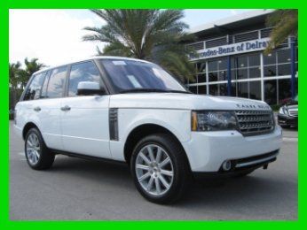 11 white supercharged awd suv *dvd video *navigation *power front &amp; rear seats