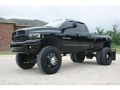 2005 dodge ram 3500 crewcab monster truck, 18 wheeler tires, leather, auto,5.9l