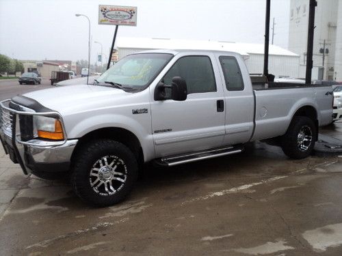 01 f250 superduty 4x4 7.3 powerstroke ext cab long box low miles only 134k act!!