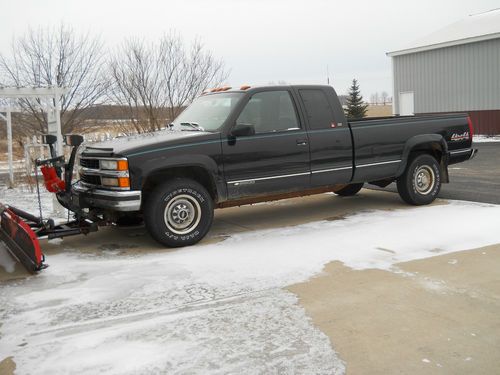 1997 black hd ext cab fltsde pick-up 4wd with western snowplow