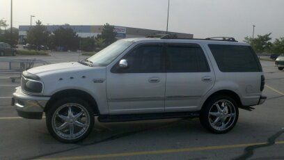 Silver, good condition, 4 doors, 4wd, 4.6l xlt with moonroof