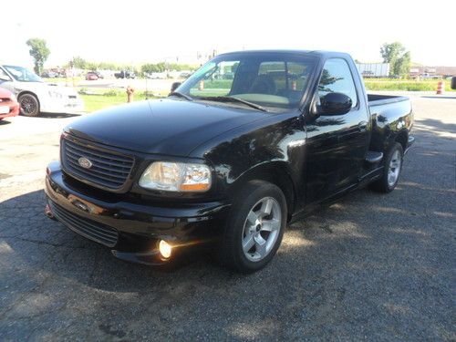 Super charged 5.4 liter v8, clean truck, runs great, warranty !!!