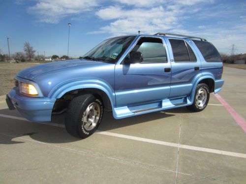 2 shade blue limited edition paint job, prof tinted windows, 4 door hatchback