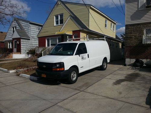 2005 chevrolet work van with shelving and drawers