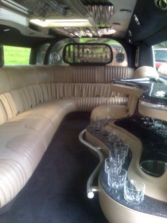 H2 140" stretch limousine 4x4 built by krystal 14 passenger