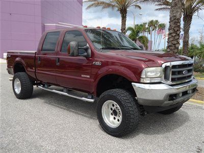 Lifted diesel crew cab short bed 4x4 cloth great truck fl