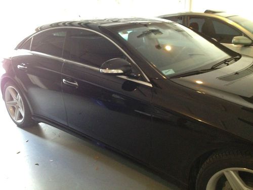 Mercedes cls550 black,4 dr,amg pkg,blk leather w/high gloss wood trim,navigatin