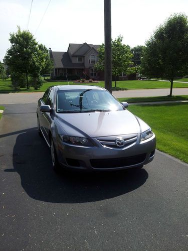 Very clean car, gray leather heated seats and silver metallic exterior, loaded.