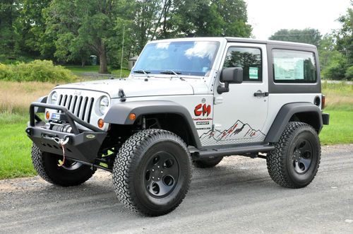 New mopar lifted 2012 jeep wrangler sport sport utility 2-door 3.6l