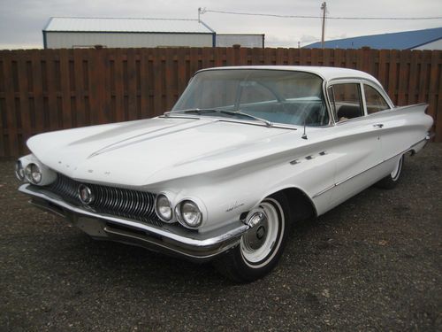 1960 buick lesabre 2 door coupe, very straight body, nice driver, runs great,