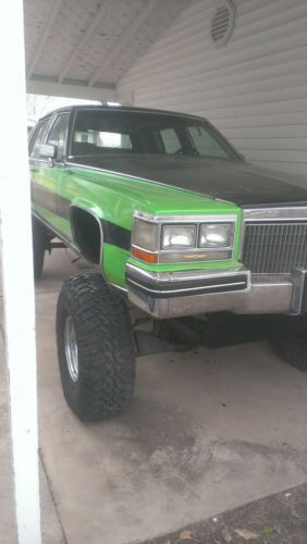 4x4 cadillac fleetwood brougham one of a kind over 3 foot tires