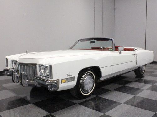 500 ci, fully loaded convertible, cotillion white on red leather, great cruiser