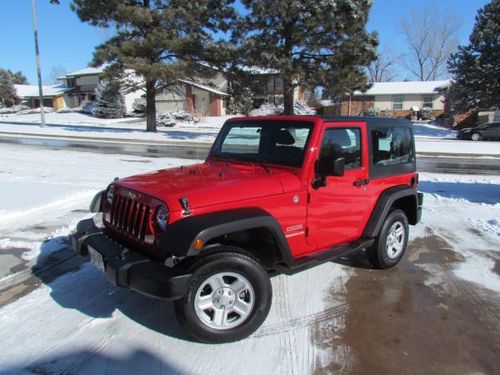 Red 2011 jeep wrangler sport, low mileage! $22,000