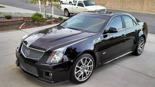 Cts-v, super charged 6.2l black beauty, low milage like new car!