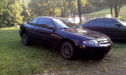 Blacked out chevrolet cavalier 2003 5spd new paint!