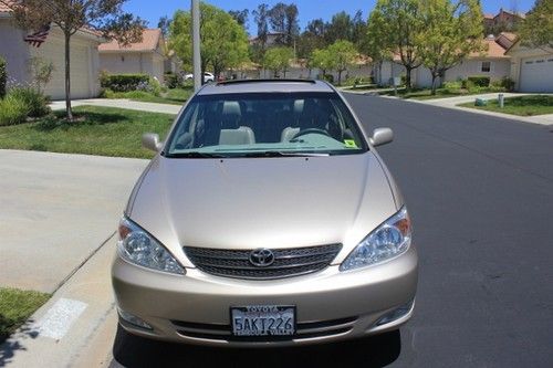 2003 camry xle.6 cyl.only42,700mi.xlnt.cond.leather seats,moonroof.new tires.