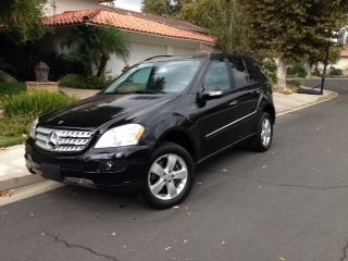 Blk/blk, good condition, maintained by mercedes, low miles