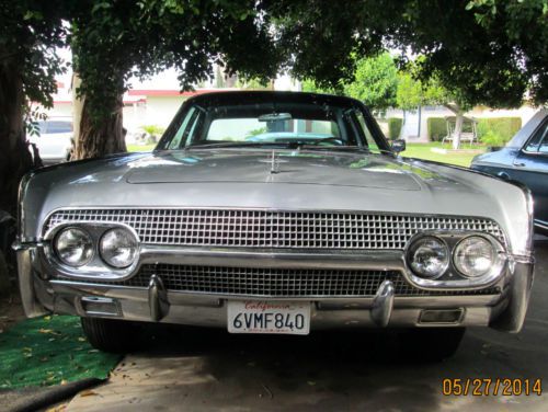 Fabulous classic 1961 lincoln continental silver suicide 4-door approx 38,250 mi