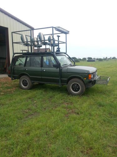 1993 range rover county hunting rig with high rack, 2" lift &amp; pro comp shocks