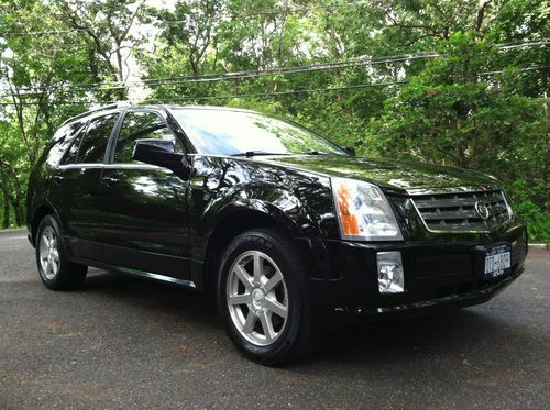 2005 cadillac srx  black fully loaded awd  low mileage 3rd row price lowered !