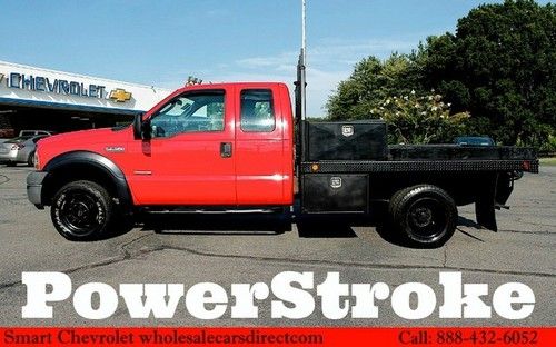 Used ford f 350 powerstroke turbo diesel 4x4 flatbed trucks utility work trucks