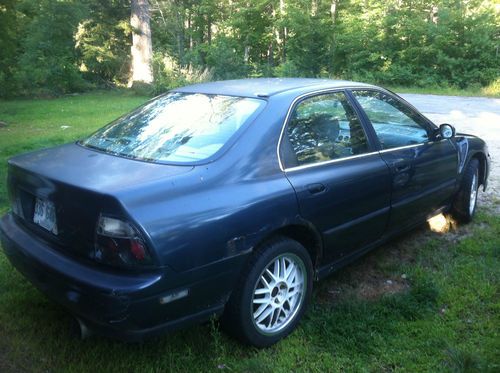 1995 honda accord with f1 style fenders, 17 inch rims, 4 door, 5 speed, blue
