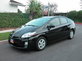 2011 toyota prius iv, only 13,000 miles. 51 mpg, leather, navi, factory warranty