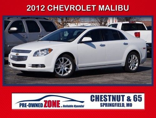 White,v6,leather,heated seats,stearing wheel mounted controls,carfax noaccidents