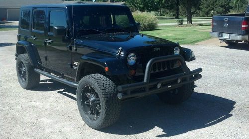 Excellent condition black jeep wrangler sahara unlimited 4 door