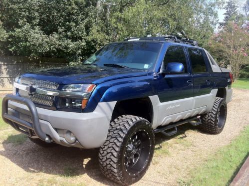 Z71 avalanche crew cab lifted 22s 35s fabtec nfab yakima loaded hids