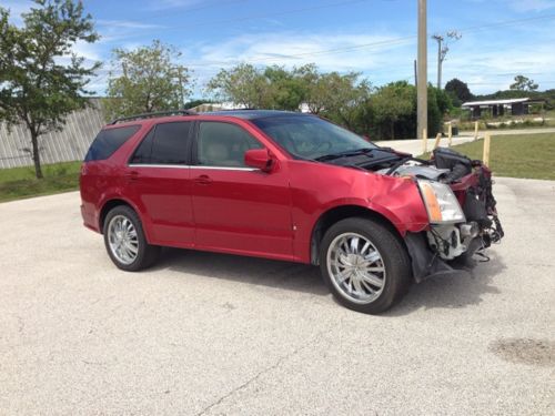 Cadillac srx suv 3 rd seat rebuildable salvage repairable red runs new car smell