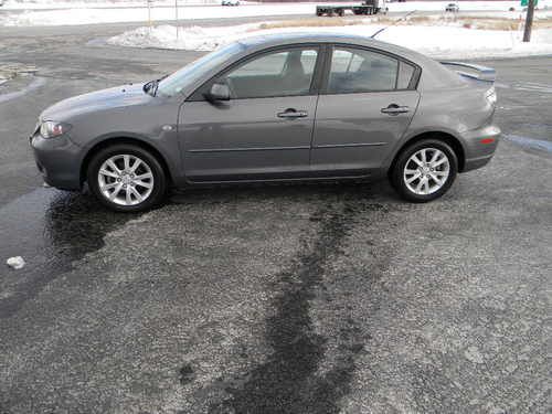 Mazda 3 4cyl auto hail damage gas saver 60k miles cheap transportation nice