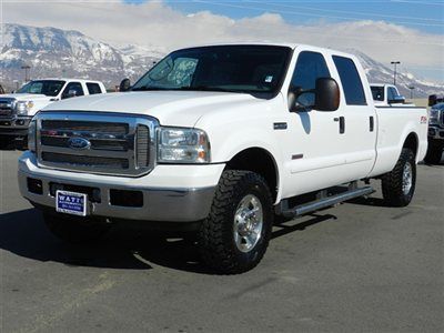 Crew cab lariat 4x4 powerstroke diesel longbed leather tow priced low sell