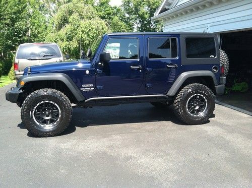 2013 jeep wrangler unlimited sport with 3" dealer installed lift