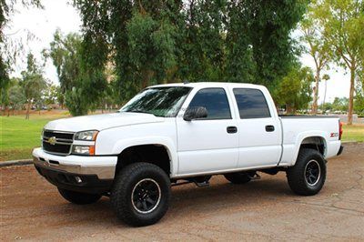 Lifted extra clean z71 4x4 with banks ram-air intake 6 inch rancho lift leather
