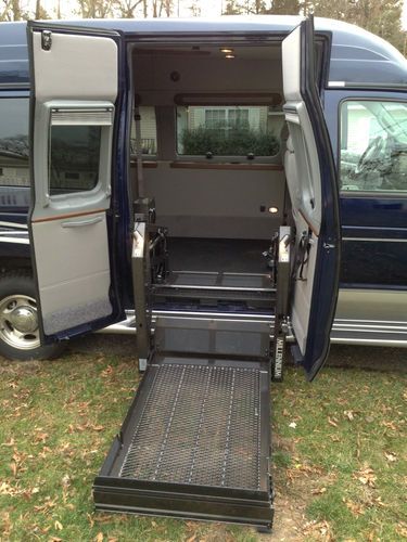 New ford e150 handicapped accessible van, lowered floor, raised roof and doors