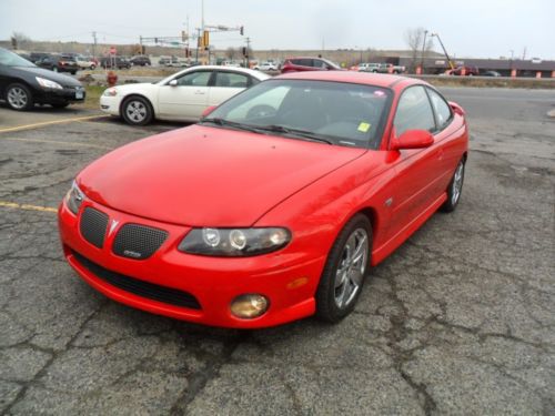 2dr, high out put 5.7 350 v8, 6 speed, bright red, extra nice, warranty !!!