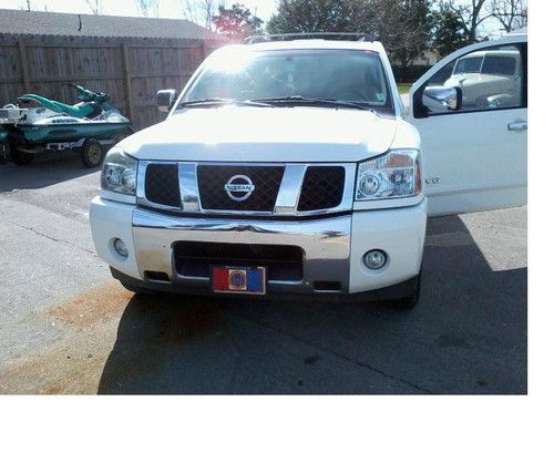 2005 nissan armada le 5.6l loaded with nav, heated seats, dvd, sunroof and more!