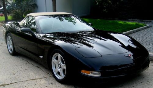 1999 roadster,black/tan leather,13koriginal miles,6spd,hud,active handling, mint