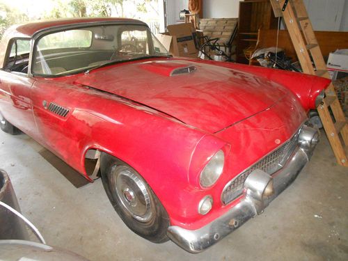 1955 ford thunderbird red with black and white interior