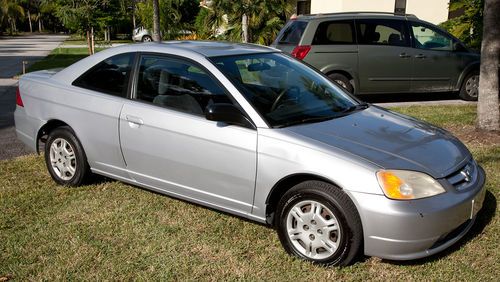 2002 honda civic, silver, 2 owners, clean title, 129,717 miles, great condition