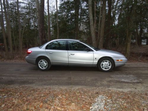 2002 saturn sl2 (silver, 4 door) low miles, well maintained!!!