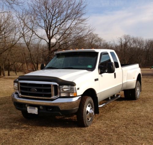Perfect ford f350 super duty xlt supercab dually, like new, very low miles!!