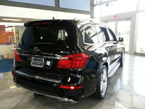 Mercedes-benz gl 550 with parktronic and rear seat entertainment.