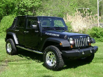 Back in black the renegade jeep unlimited procomp wheels skjacker lift automatic